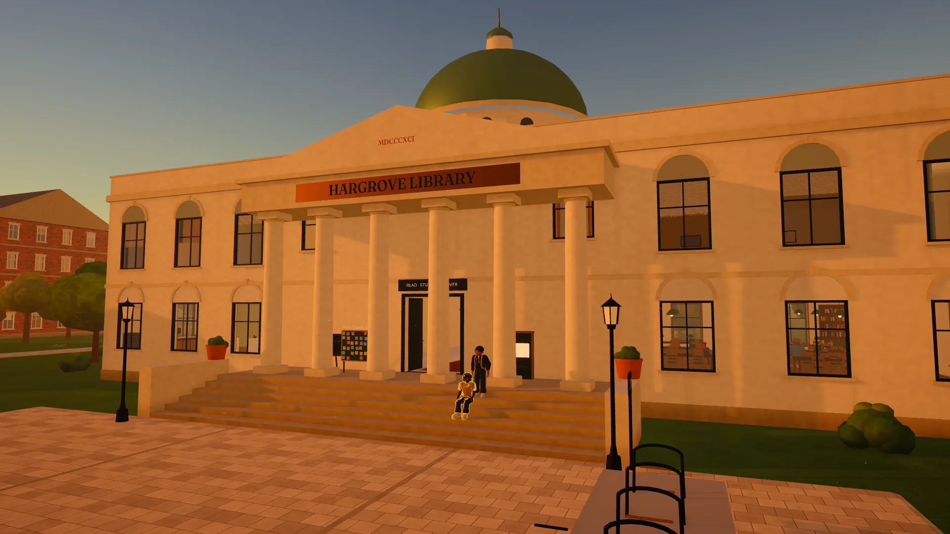 Hargrove Library at sunset: a domed classical building with columns, students on the front steps and lamps along the plaza.